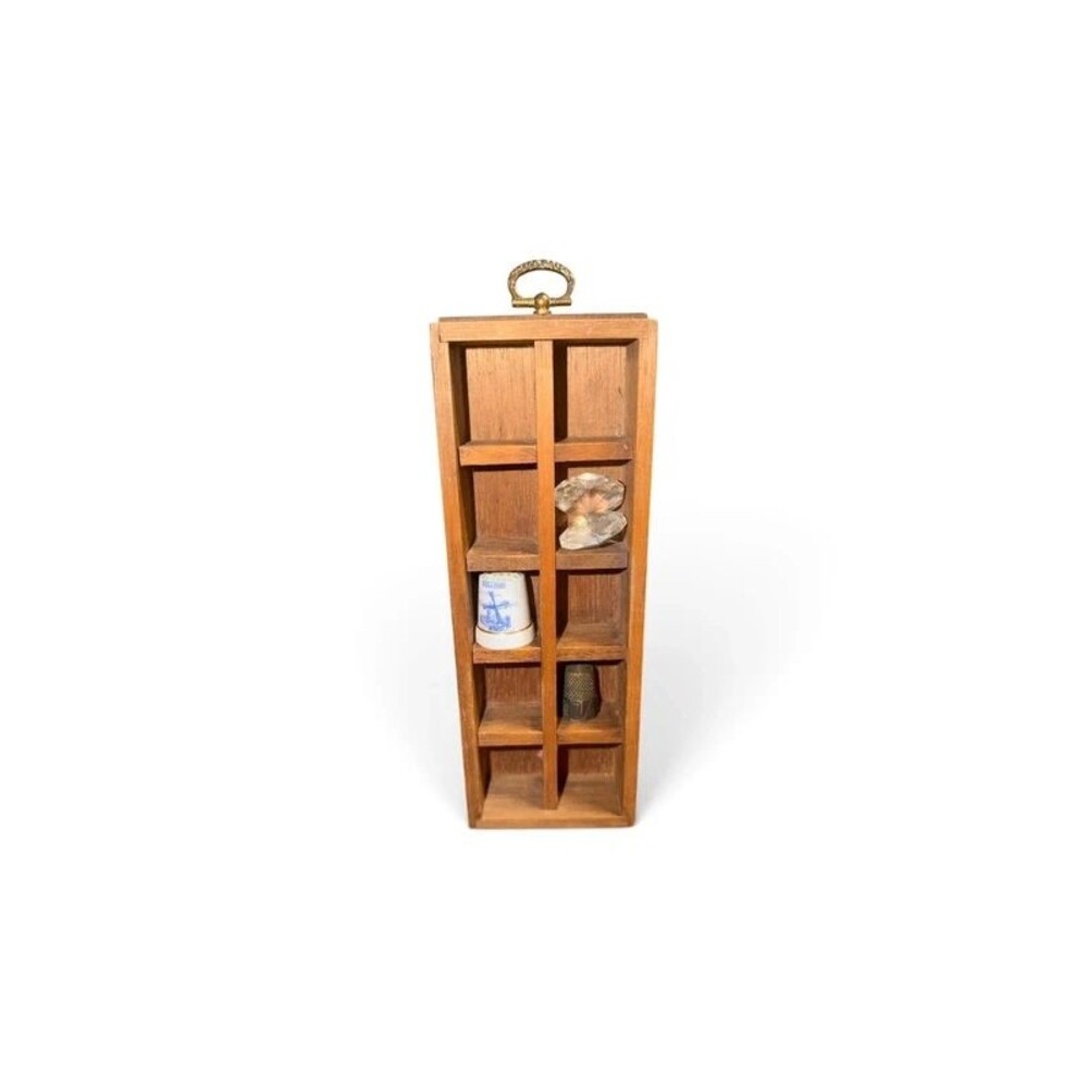 Mini trinket shelf with three trinkets